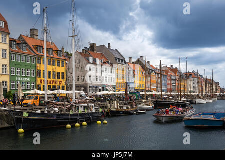 Copenhagen, Denmark - June 16, 2017: Nyhavn Pier with color Buildings and Ships Stock Photo