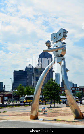 Traveling Man Walking Tall by Brad Oldham is across from the Deep Ellum DART station and one of three neighborhood sculptures east of downtown Dallas Stock Photo