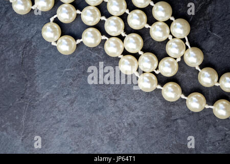 Fake Pearls on a grey background