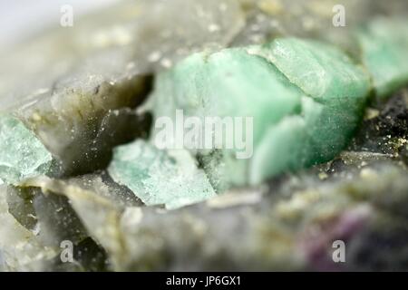 Rough Brazilian Emerald gemstone Stock Photo