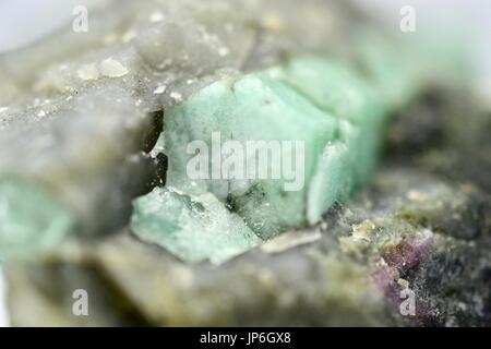 Rough Brazilian Emerald gemstone Stock Photo