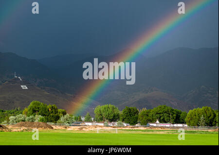 Rainbow over the small mountain town of Salida, Colorado, USA Stock Photo