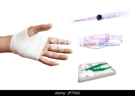 Injured painful hand with white gauze bandage and Wound Kit Stock Photo