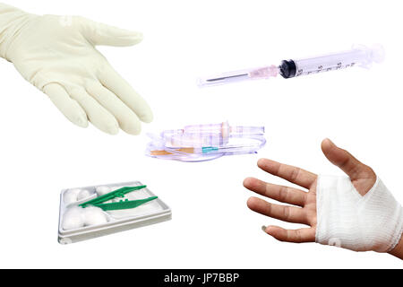 Injured painful hand with white gauze bandage and Wound Kit Stock Photo