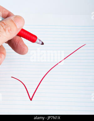A big red checkmark, the sign of rejection Stock Photo