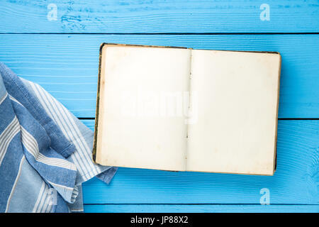 Opened blank cookbook. Top view. Recipe book with copy space on blank sheets. Stock Photo