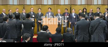 Japanese Prime Minister Shinzo Abe greets business leaders at a reception for the 6th Asian Business Summit hosted by the Japan Business Federation, known as Keidanren, in Tokyo on July 13, 2015. (Kyodo) ==Kyodo