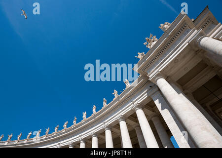 Horizontal angular view of the colonnades encircling St Peter's Square at the Vatican in Rome. Stock Photo