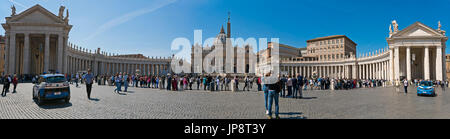 Horizontal panoramic view of St Peter's Square and St Peter's Basilica at the Vatican in Rome. Stock Photo
