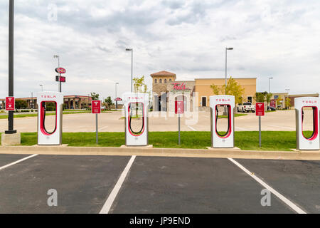 480 Volt Tesla Charging Station for Tesla mlodel S, X and 3 located in West Oklahoma City, near Reno & Council roads.Oklahoma, USA. Stock Photo