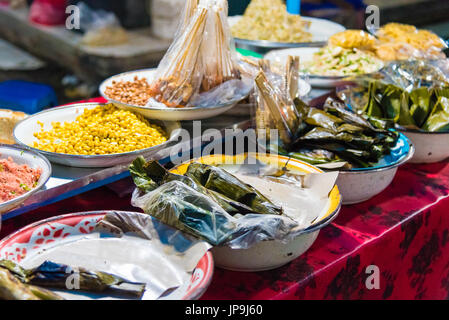 Food stalls at Gianyar Night Market, a top destination for hungry locals and tourists, offering a large variety of traditional balinese food in Gianya Stock Photo