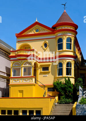 Queen Anne Style Victorian House at Alamo Square, San Francisco, California, USA Stock Photo