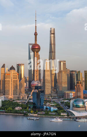 China, Shanghai City, Pudong Skyline, Oriental Pearl, World Financial Center and Shanghai Towers, Huangpu River, Stock Photo