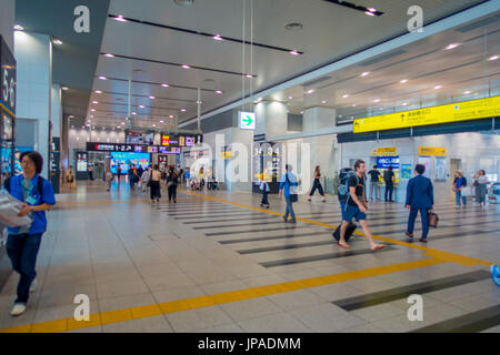 OSAKA, JAPAN - JULY 18, 2017: Unidentified people at Kansai International Airport, Osaka. It is an international airport located on an artificial island in the middle of Osaka Bay Stock Photo