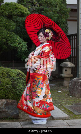 Japan, Okayama, Kurashiki City, Japanese girl in traditional costume Stock Photo