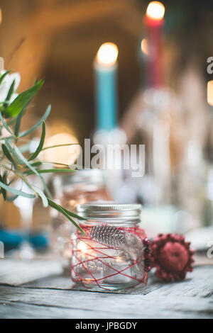 festively decorated table with candles, close up Stock Photo