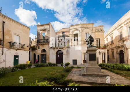 Statues and baroque style buildings surrounded by gardens in the old town of Lecce Apulia Italy Europe Stock Photo