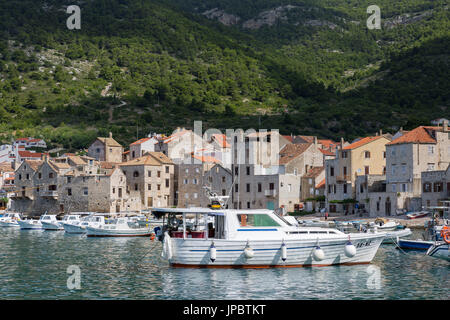 View of Komiza village (Komiza, Vis, Vis Island, Split-Dalmatia county, Dalmatia region, Croatia, Europe) Stock Photo