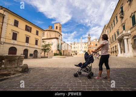 A view of the historical buildings and obelisk of the ancient Piazza Federico II Jesi Province of Ancona Marche Italy Europ Stock Photo