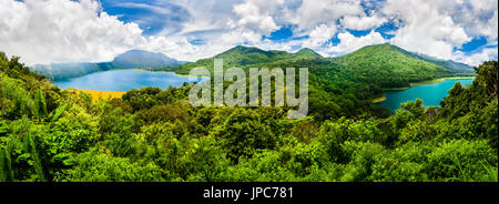 Amazing top view panoramic landscape on The volcanic Buyan Lake & Danau Tamblingan on background volcanic mountain overgrown tropical rainforest, Bali Stock Photo