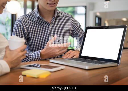 Team work process. young business managers working with startup project. analyze graph plan and presentation Stock Photo
