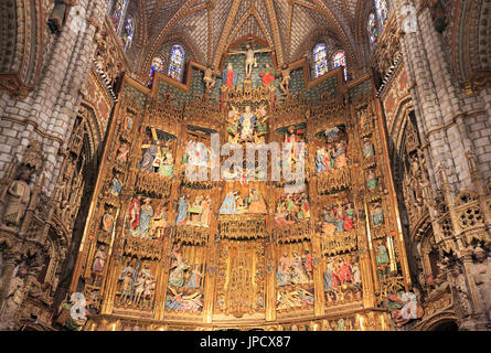 The Main altar in the interior of the Primate Cathedral of Saint Mary of Toledo, a Roman Catholic 13th-century High Gothic UNESCO cathedral. Stock Photo