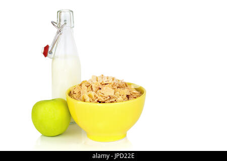 Energy breakfast for diet cereal flakes of corn milk and green apple isolated on white background with copy space Stock Photo