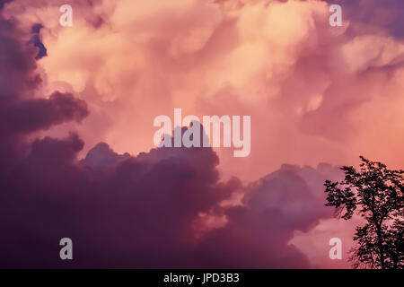 Great purple clouds on sky before storm Stock Photo