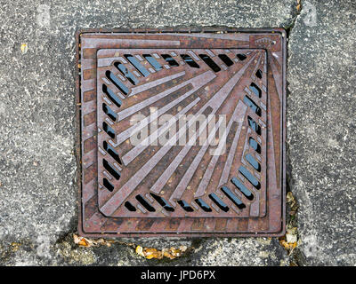 Shell symbol on drainage grids - on the Route of Santiago de Compostela, Lacommande, France. Stock Photo