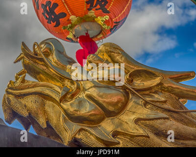 Maokong, Taiwan - October 19, 2016: A golden dragons  on the censer and red Chinese lanterns Stock Photo