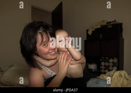 Mom suck child boy mom and thumb sucking baby Stock Photo - Alamy