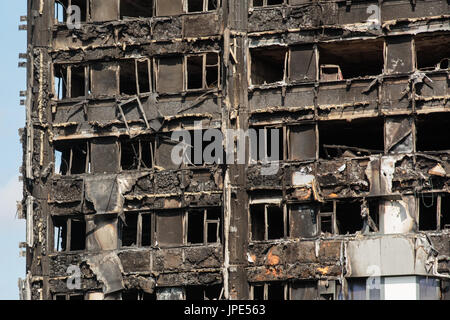 Close up view of the remains of Grenfell Tower, a residential  block of flats. At least 80 people died following a horrific fire on 14th June 2017. Stock Photo