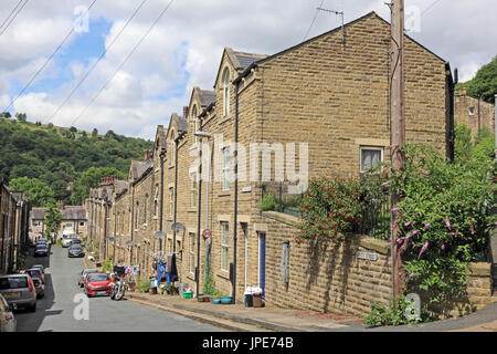 Row of terraced houses along back streets of Hebden Bridge, West Yorkshire Stock Photo