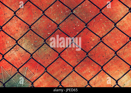 Chain link fence as grunge background, mixed media Stock Photo