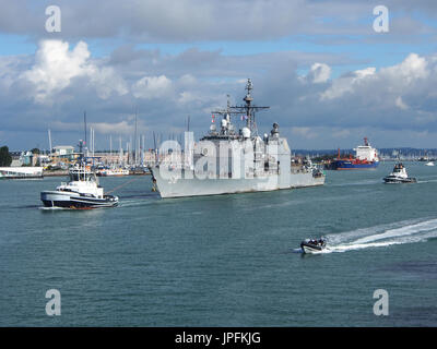 Portsmouth, Hampshire, UK. 01st Aug, 2017. The USS Philippine Sea, CG-58, a Flight II Ticonderoga-class guided missile cruiser, leaves Portsmouth Harbour after a week long visit along with other ships involved in Operation Inherent Resolve, the Global Coalition’s fight against ISIS. Other members of the task group included USS Donald Cook, Norwegian ship HNoMS Helge Insgstad and USS George H W Bush a Nimitz class, nuclear powered aircraft carrier. Credit: simon evans/Alamy Live News Stock Photo