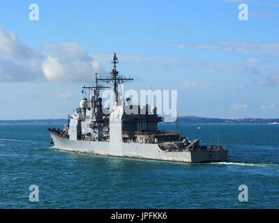 Portsmouth, Hampshire, UK. 01st Aug, 2017. The USS Philippine Sea, CG-58, a Flight II Ticonderoga-class guided missile cruiser, leaves Portsmouth Harbour after a week long visit along with other ships involved in Operation Inherent Resolve, the Global Coalition’s fight against ISIS. Credit: simon evans/Alamy Live News Stock Photo