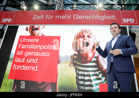 Berlin, Germany. 1st Aug, 2017. Hubertus Heil, the general secretary of the SPD, presents the party's electoral campaign posters in Willy Brandt House in Berlin, Germany, 1 August 2017. Photo: Kay Nietfeld/dpa/Alamy Live News Stock Photo