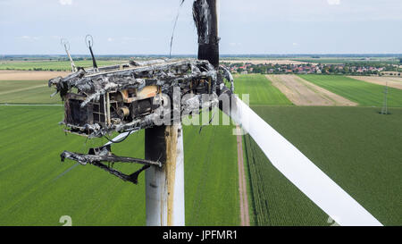 Kothen, Germany. 01st Aug, 2017. Picture of a burned wind turbine taken at a wind farm in Kothen, Germany, 01 August 2017. On Tuesday morning the fire department put off the falling, lit debris and allowed the turbine itself to burn out in a controlled manner. The cause of the fire is thought to be a strike of lightning (aerial shots taken with a drone). Photo: Jan Woitas/dpa-Zentralbild/ZB/dpa/Alamy Live News Stock Photo
