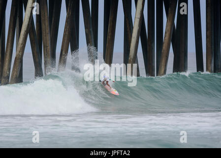 Huntington Beach, USA. 01 August, 2017. Pauline Ado (FRA) competes in the early rounds of the Women's 2017 VANS US Open of Surfing, on Tuesday, 01 August, 2017. Credit: Benjamin Ginsberg/Alamy Live News. Stock Photo