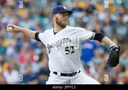 Milwaukee, WI., USA. 1st August, 2017. Milwaukee Brewers starting pitcher Jimmy Nelson #52 delivers a pitch in the first inning of the Major League Baseball game between the Milwaukee Brewers and the St. Louis Cardinals at Miller Park in Milwaukee, WI. John Fisher/CSM Stock Photo
