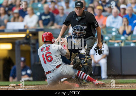 Milwaukee, WI., USA. 1st August, 2017. Milwaukee Brewers catcher Manny Pina #9 tags out St. Louis Cardinals baserunner Kolten Wong #16 at the plate in the Major League Baseball game between the Milwaukee Brewers and the St. Louis Cardinals at Miller Park in Milwaukee, WI. John Fisher/CSM Stock Photo