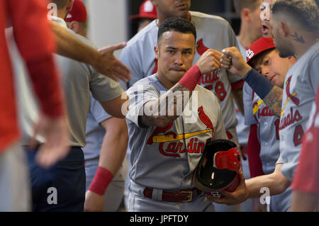 Milwaukee, WI., USA. 1st August, 2017. St. Louis Cardinals second baseman Kolten Wong #16 is congratulated after scoring in 5th inning of the Major League Baseball game between the Milwaukee Brewers and the St. Louis Cardinals at Miller Park in Milwaukee, WI. John Fisher/CSM Stock Photo