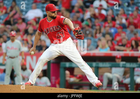 August 1, 2017: Los Angeles Angels center fielder Mike Trout (27) shows his  new haircut as he chats with an umpire during a review timeout in the game  between the Philadelphia Phillies