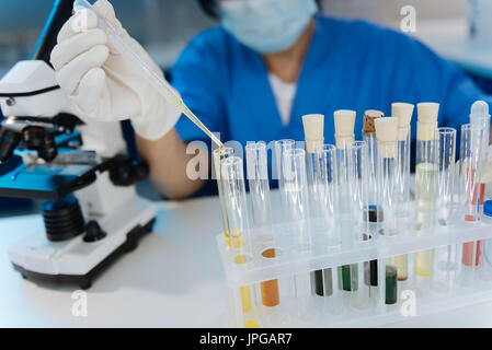 Close up of test tubes standing on the table Stock Photo