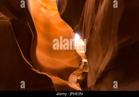 Lower antelope canyon in Page, AZ is a mysterious place that attracts many tourists and photographers. Stock Photo