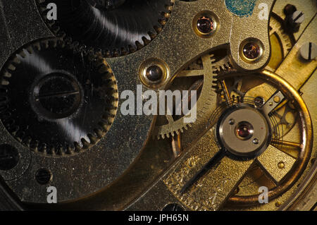 Antique Pocket Watch Mechanism. Steampunk and industrial theme Stock Photo