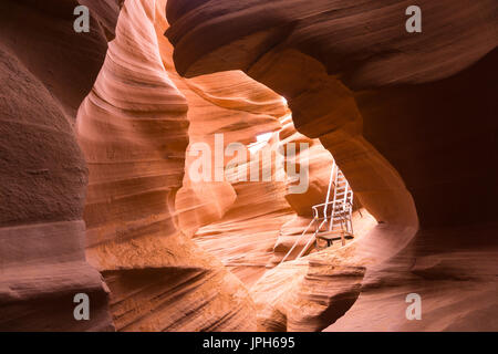 Lower antelope canyon in Page, AZ is a mysterious place that attracts many tourists and photographers. Stock Photo