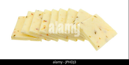 Small group of fresh pepper jack cheese squares in a row isolated on a white background. Stock Photo