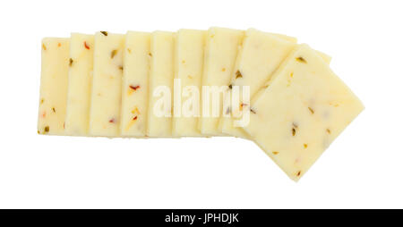 Top view of a small group of fresh pepper jack cheese squares in a row isolated on a white background. Stock Photo