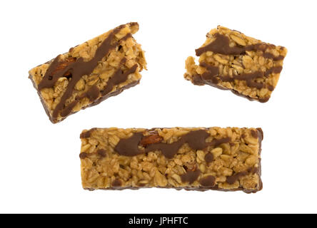 Top view of two chocolate with nuts granola bars with one that has been broken in half and another whole isolated on a white background. Stock Photo